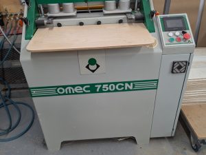 Machine a queue d'aronde Omec 750 CNC 2015
