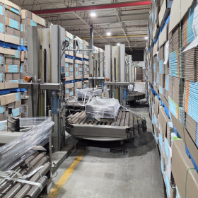 Emballeuse à palette Muller 405A avec convoyeur