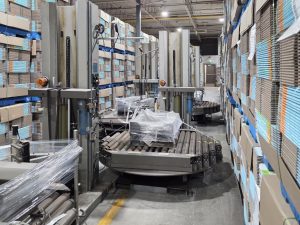 Emballeuse à palette Muller 405A avec convoyeur